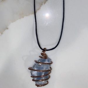 Blue calcite crystal with copper necklace